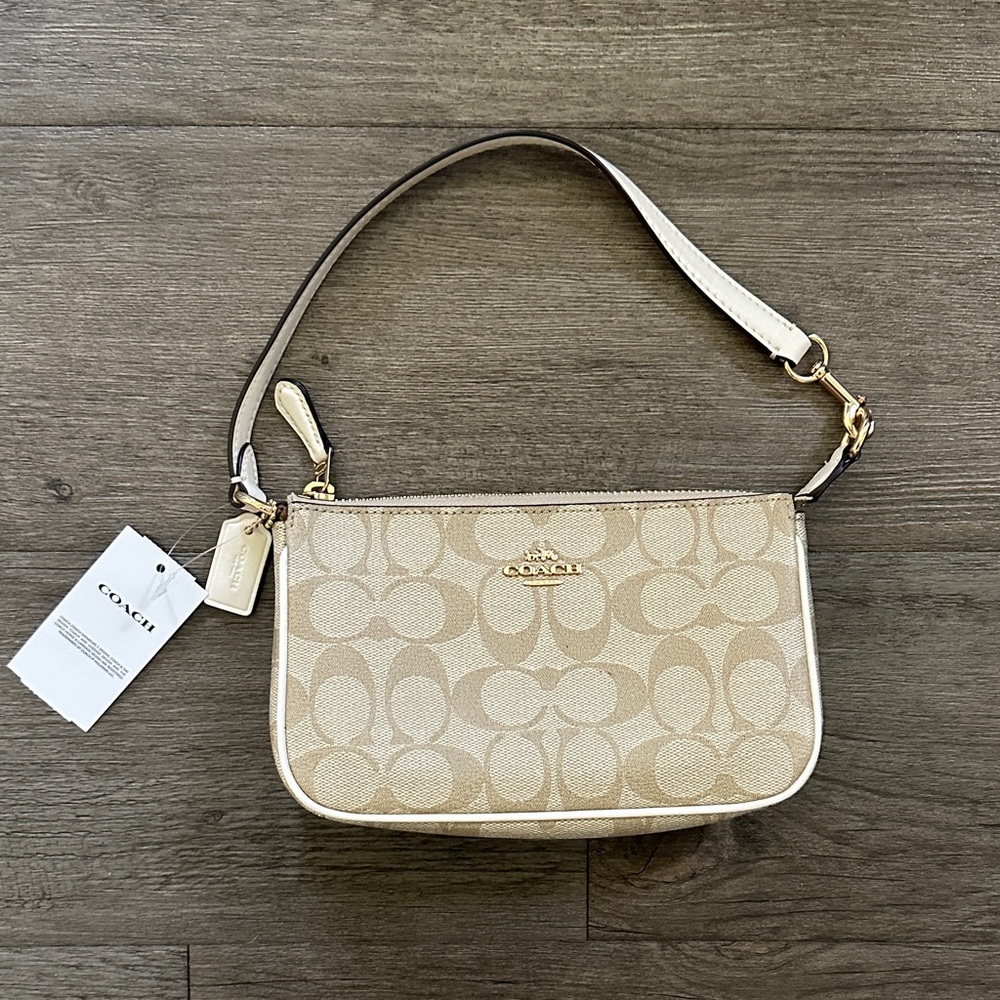 Coach “Nolita” Tan Signature Mini Bag